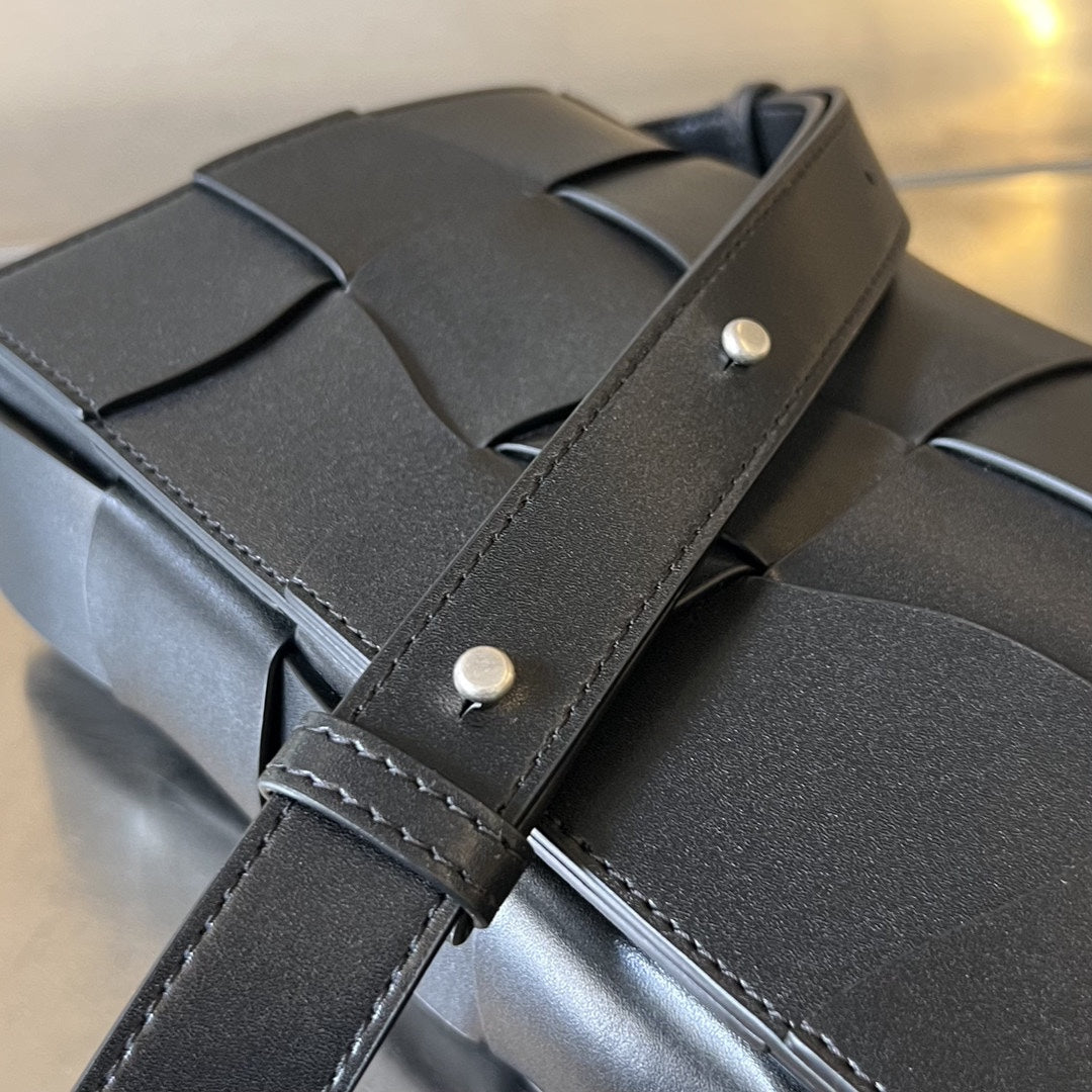 Bottega Veneta Cassette 23 in Black Calfskin with Wavy Pattern Bag