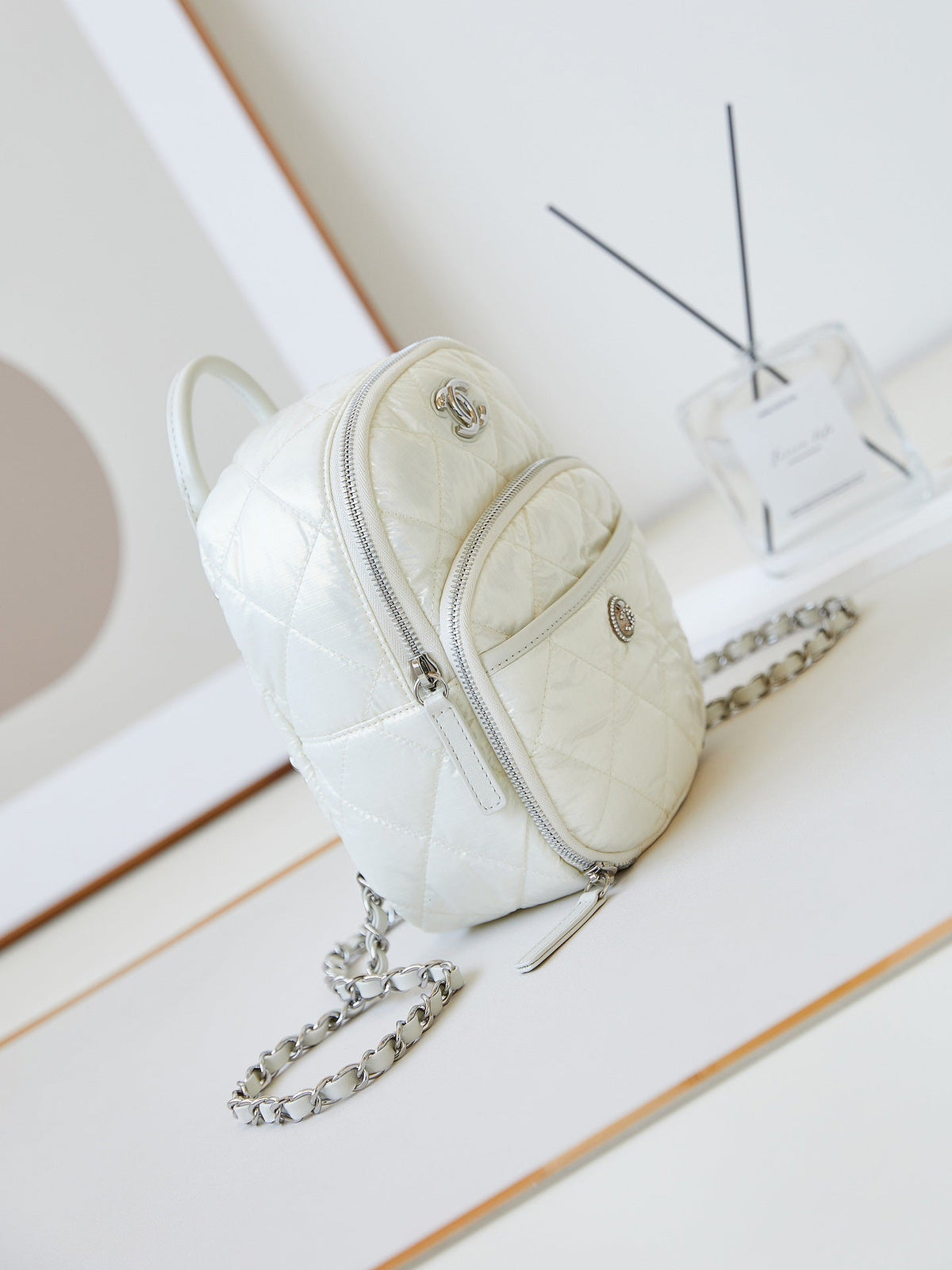 Chanel Backpack 22 in White Fabric Silver Hardware