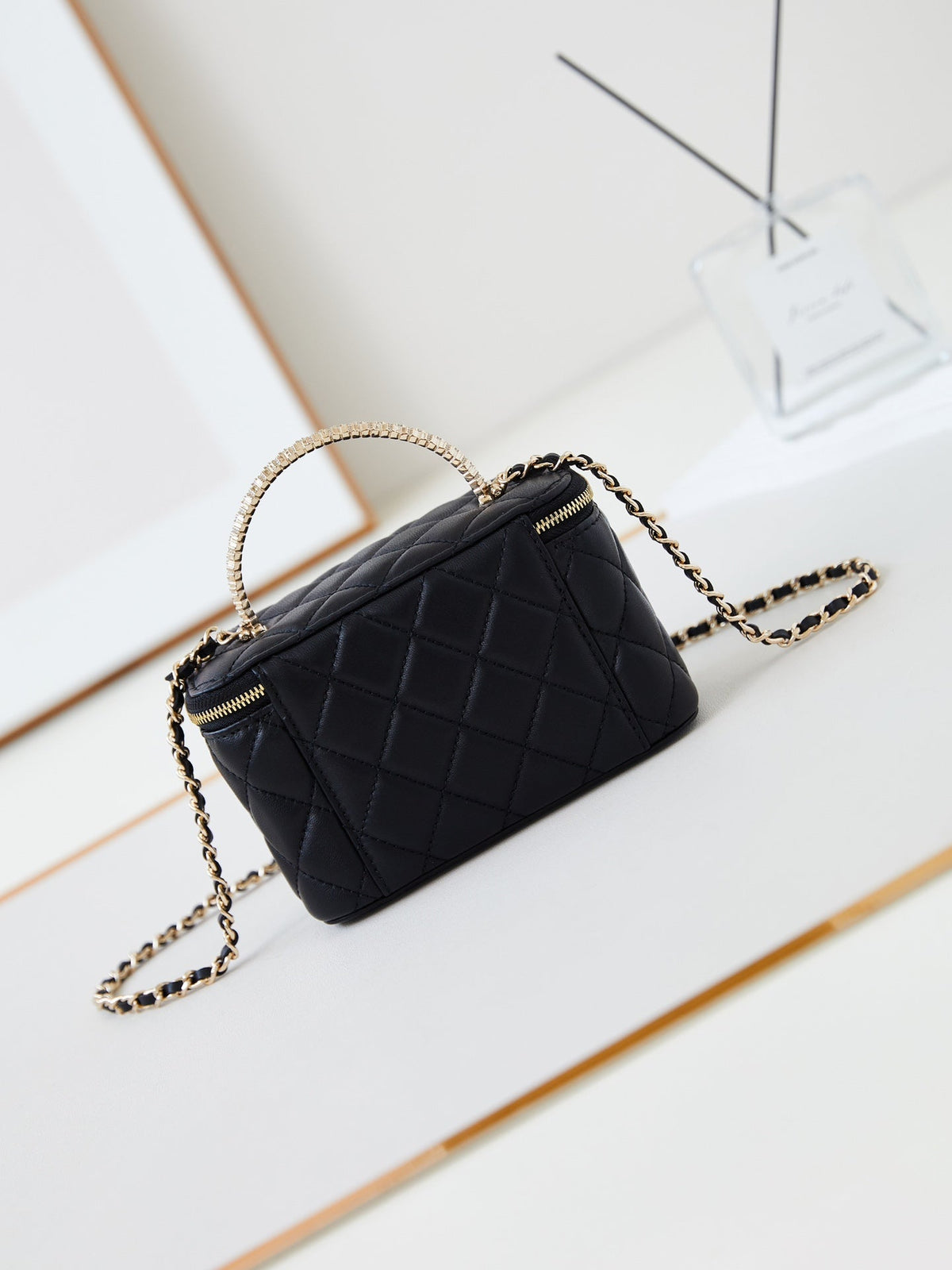 Chanel 25S Mini Vanity Bag 16 cm in Black Lambskin with Crystal-Embellished Logo