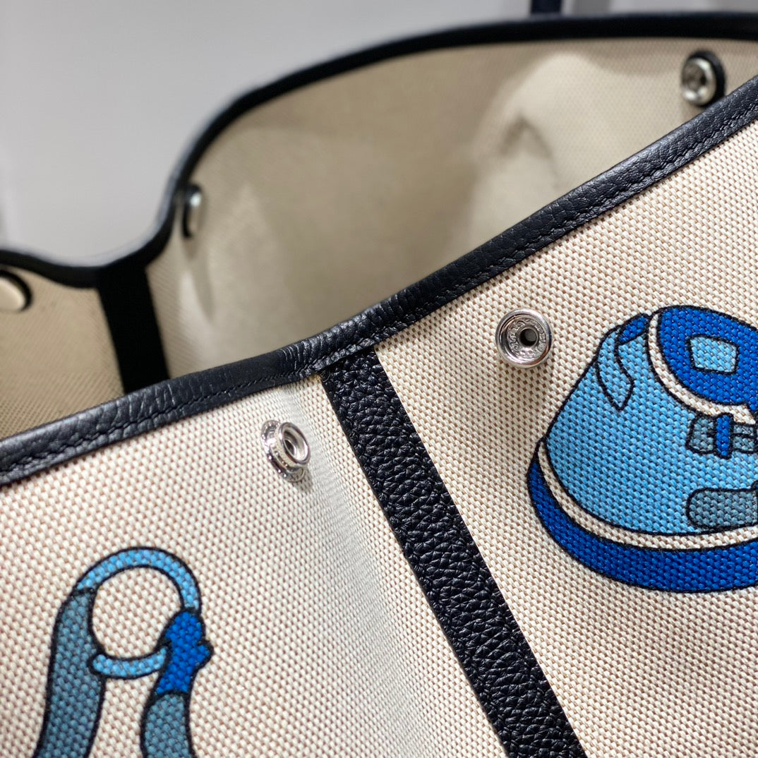 Hermes Garden Party 36 in Blue Ivory Toile H Canvas Black Calfskin Equestrian Harness Print Bag