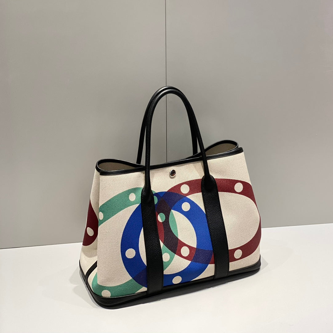 Hermes Garden Party 36 in Multicolor Toile H Canvas Black Calfskin Overlapping Polka Rings Print Bag